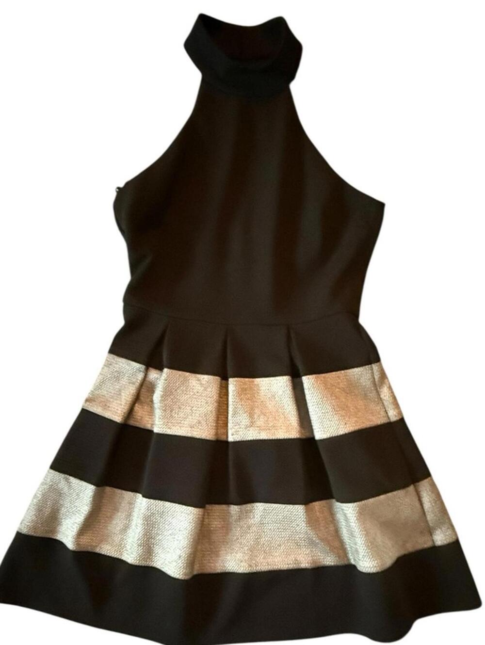 Black halter dress with bold silver metallic stripes and a flared bottom